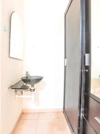 Imagen de la habitación del Hotel OYO 122 Oekude Kost. Foto 8
