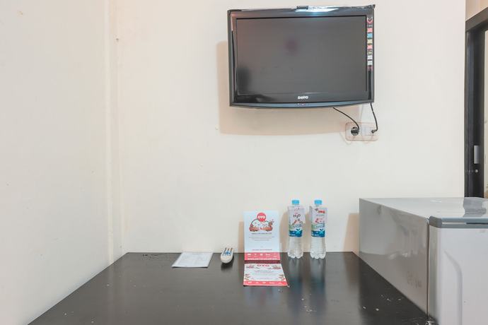 Imagen de la habitación del Hotel OYO 122 Oekude Kost. Foto 9