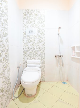 Imagen de la habitación del Hotel OYO 122 Oekude Kost. Foto 10