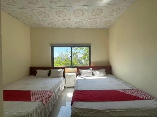 Imagen de la habitación del Hotel OYO 1228 Gia Hoang Homestay. Foto 20