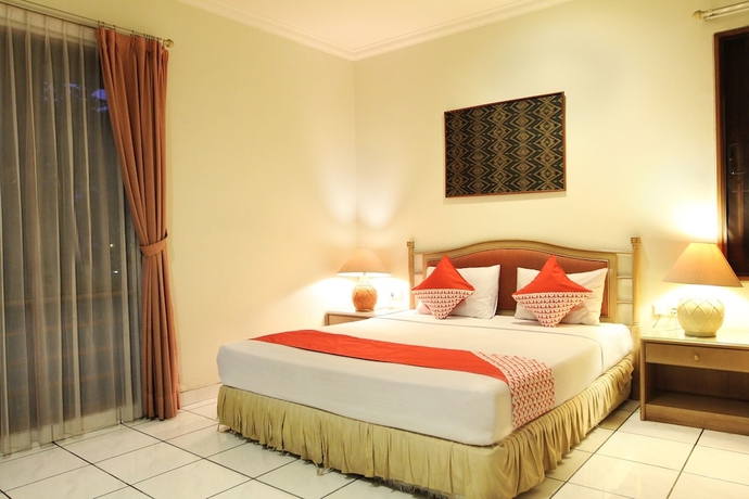 Imagen de la habitación del Hotel OYO 123 Puri Lotus. Foto 3