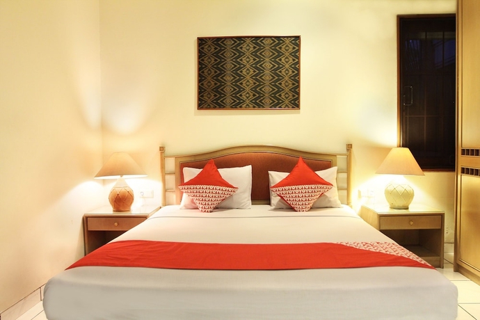 Imagen de la habitación del Hotel OYO 123 Puri Lotus. Foto 4