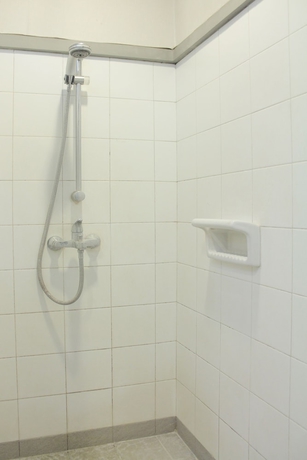 Imagen de la habitación del Hotel OYO 123 Puri Lotus. Foto 8