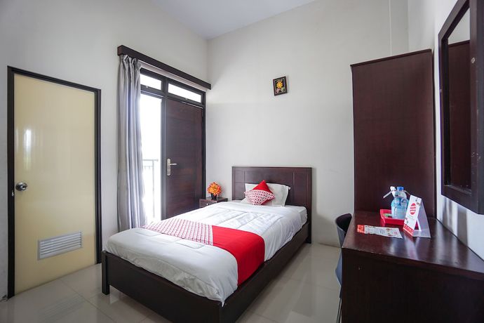 Imagen de la habitación del Hotel OYO 1236 Elite Residence. Foto 2