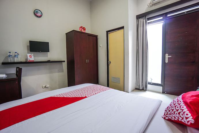 Imagen de la habitación del Hotel OYO 1236 Elite Residence. Foto 5