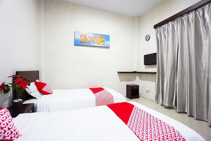 Imagen de la habitación del Hotel OYO 1236 Elite Residence. Foto 6