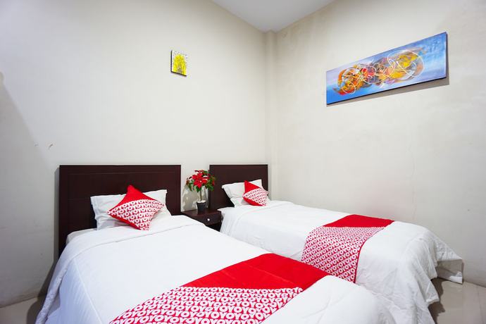 Imagen de la habitación del Hotel OYO 1236 Elite Residence. Foto 8