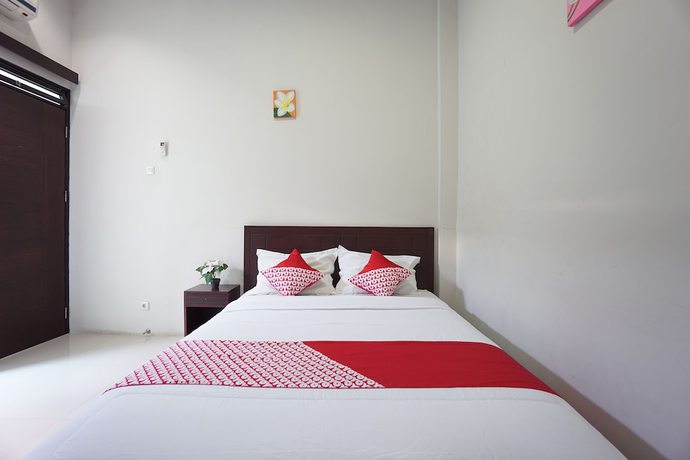 Imagen de la habitación del Hotel OYO 1236 Elite Residence. Foto 9