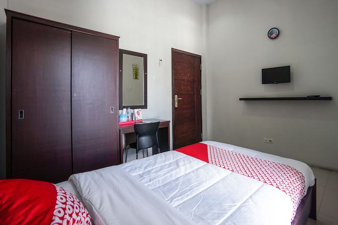 Imagen de la habitación del Hotel OYO 1236 Elite Residence. Foto 10