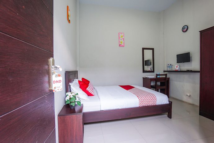 Imagen de la habitación del Hotel OYO 1236 Elite Residence. Foto 11