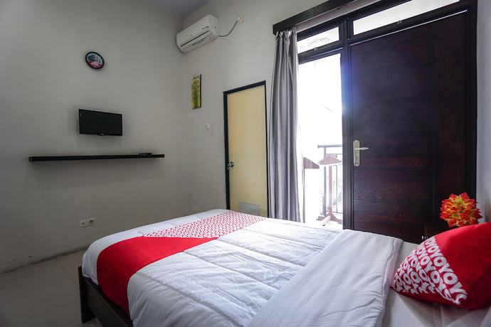 Imagen de la habitación del Hotel OYO 1236 Elite Residence. Foto 12