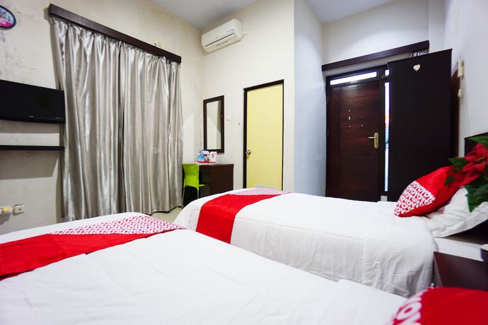 Imagen de la habitación del Hotel OYO 1236 Elite Residence. Foto 14