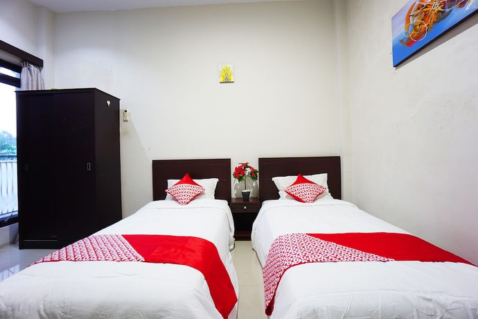 Imagen de la habitación del Hotel OYO 1236 Elite Residence. Foto 15
