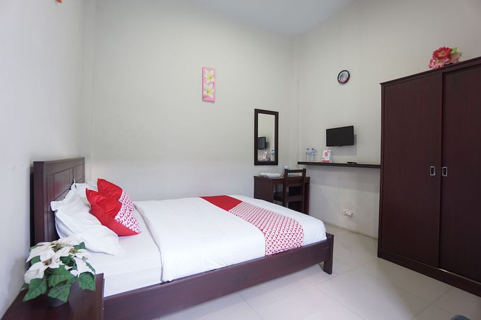 Imagen de la habitación del Hotel OYO 1236 Elite Residence. Foto 17