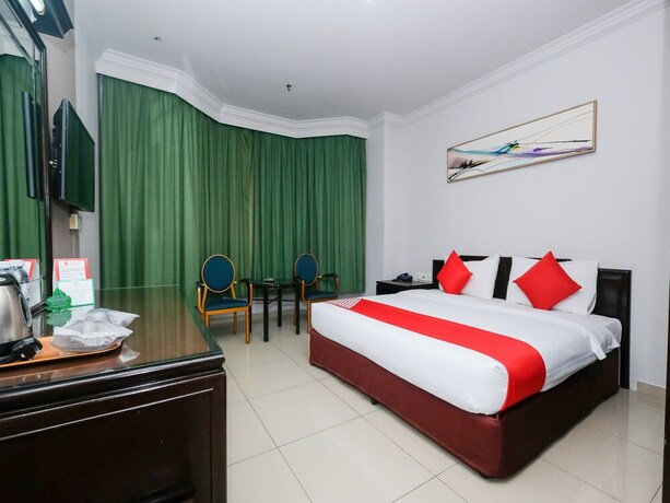 Imagen de la habitación del Hotel OYO 1236 Hotel Green Park. Foto 12