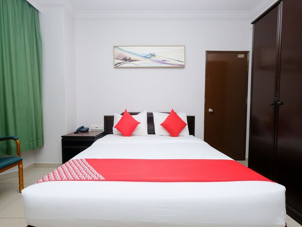 Imagen de la habitación del Hotel OYO 1236 Hotel Green Park. Foto 19