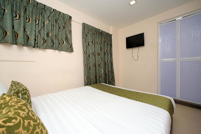 Imagen de la habitación del Hotel OYO 124 Hotel Seniman Sentul. Foto 6
