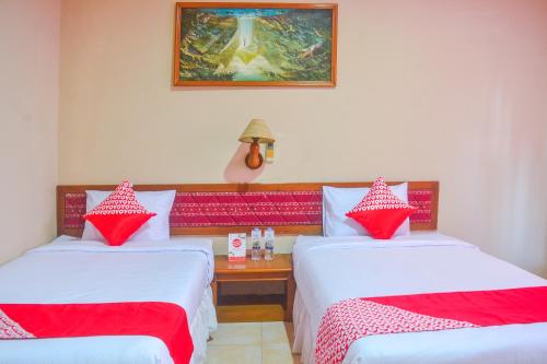 Imagen de la habitación del Hotel OYO 1240 Pantai Jaya. Foto 5