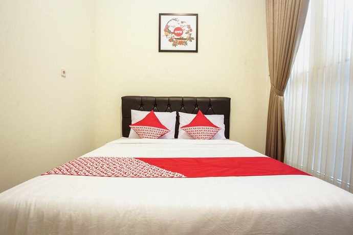 Imagen de la habitación del Hotel OYO 1241 Eirini Family Homestay. Foto 2