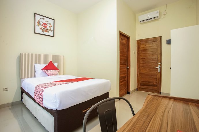 Imagen de la habitación del Hotel OYO 1241 Eirini Family Homestay. Foto 4