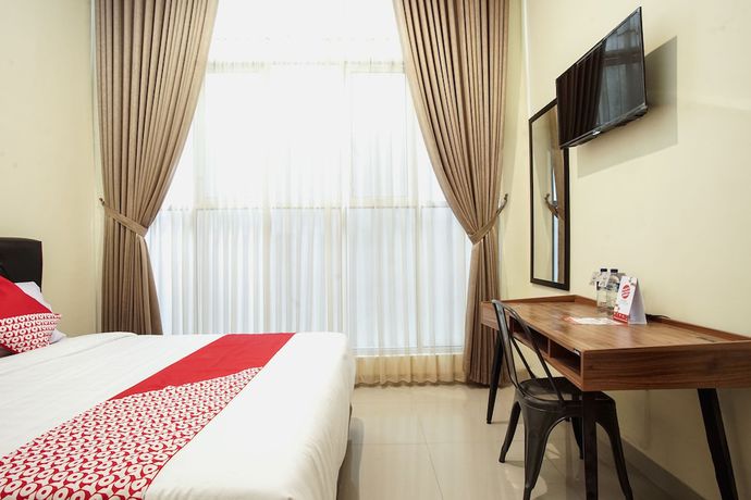 Imagen de la habitación del Hotel OYO 1241 Eirini Family Homestay. Foto 5