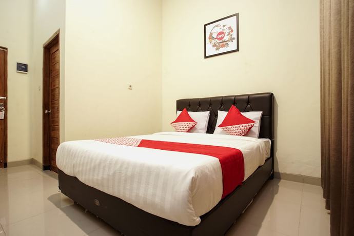 Imagen de la habitación del Hotel OYO 1241 Eirini Family Homestay. Foto 6