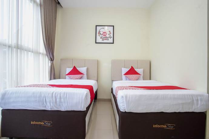 Imagen de la habitación del Hotel OYO 1241 Eirini Family Homestay. Foto 9