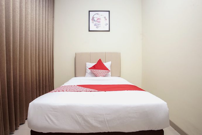 Imagen de la habitación del Hotel OYO 1241 Eirini Family Homestay. Foto 10