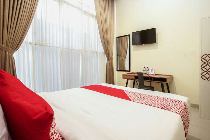 Imagen de la habitación del Hotel OYO 1241 Eirini Family Homestay. Foto 11