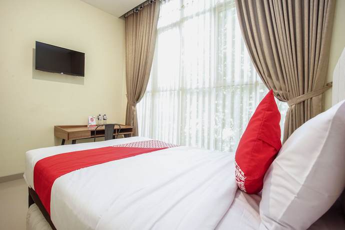 Imagen de la habitación del Hotel OYO 1241 Eirini Family Homestay. Foto 12