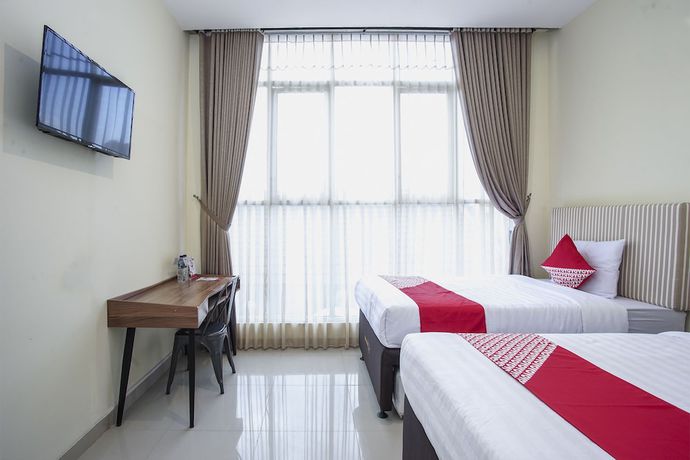 Imagen de la habitación del Hotel OYO 1241 Eirini Family Homestay. Foto 14