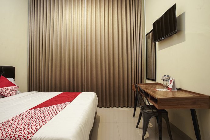 Imagen de la habitación del Hotel OYO 1241 Eirini Family Homestay. Foto 15