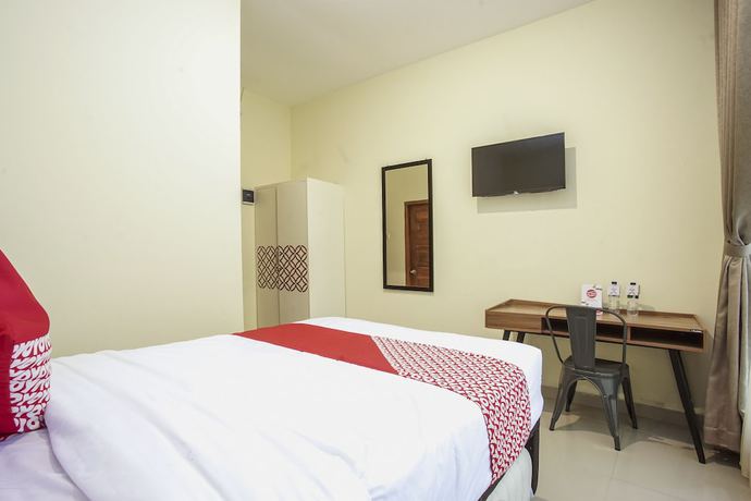 Imagen de la habitación del Hotel OYO 1241 Eirini Family Homestay. Foto 17