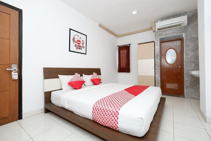 Imagen de la habitación del Hotel OYO 1251 Residence 8, Pekunden. Foto 16