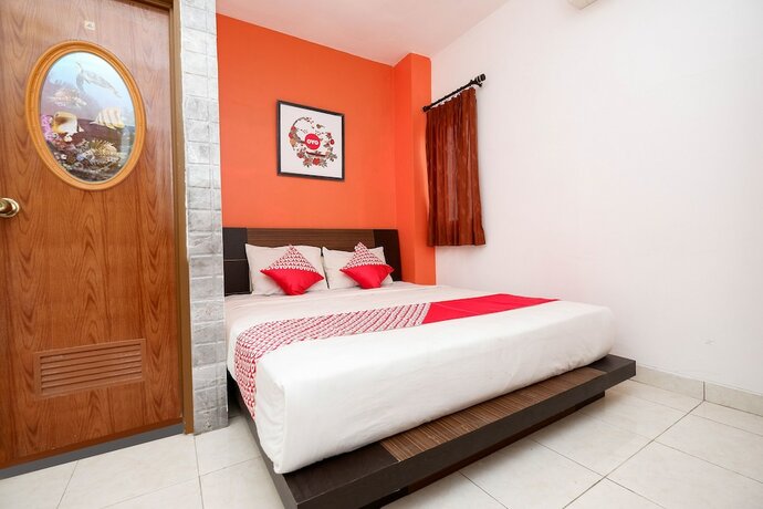 Imagen de la habitación del Hotel OYO 1251 Residence 8, Pekunden. Foto 19