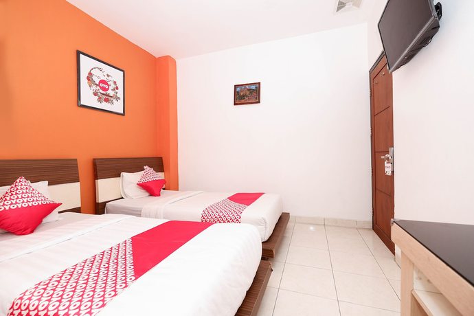 Imagen de la habitación del Hotel OYO 1251 Residence 8, Semarang. Foto 5