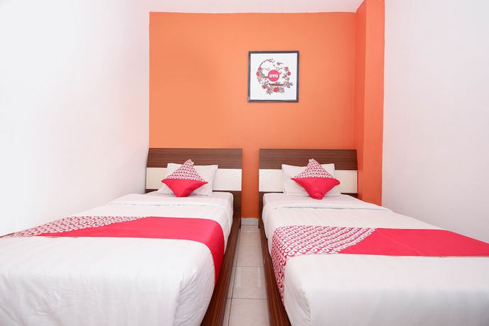Imagen de la habitación del Hotel OYO 1251 Residence 8, Semarang. Foto 7
