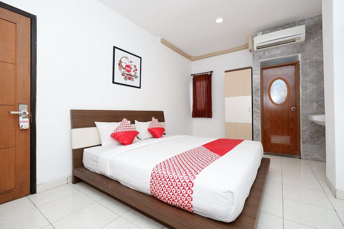 Imagen de la habitación del Hotel OYO 1251 Residence 8, Semarang. Foto 8