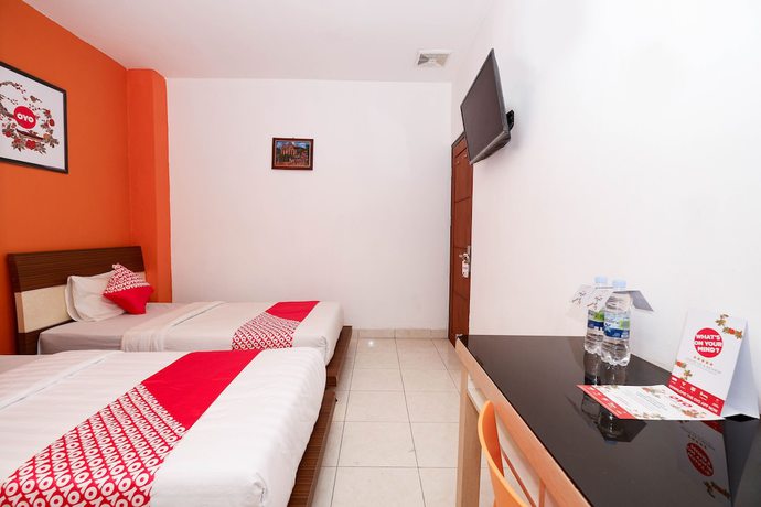 Imagen de la habitación del Hotel OYO 1251 Residence 8, Semarang. Foto 9