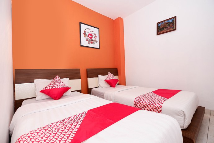 Imagen de la habitación del Hotel OYO 1251 Residence 8, Semarang. Foto 10