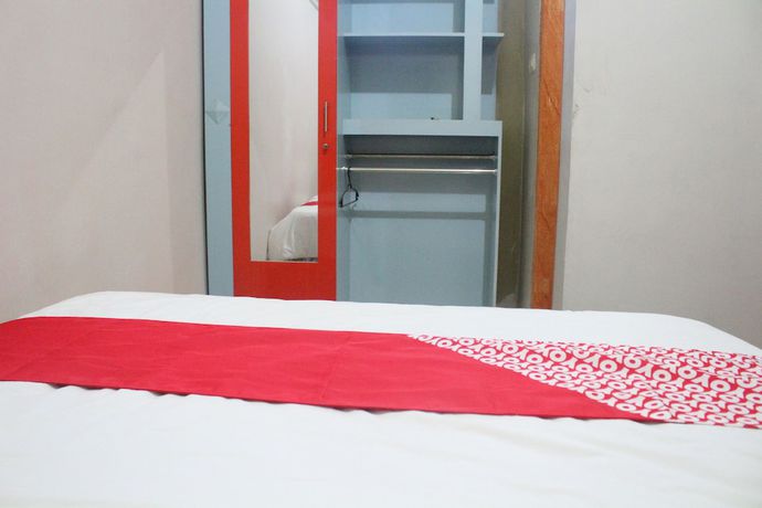 Imagen de la habitación del Hotel OYO 1263 Jazz Anna. Foto 3