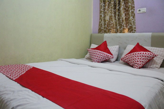 Imagen de la habitación del Hotel OYO 1263 Jazz Anna. Foto 4