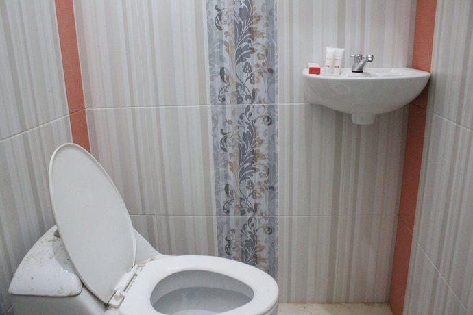 Imagen de la habitación del Hotel OYO 1263 Jazz Anna. Foto 7