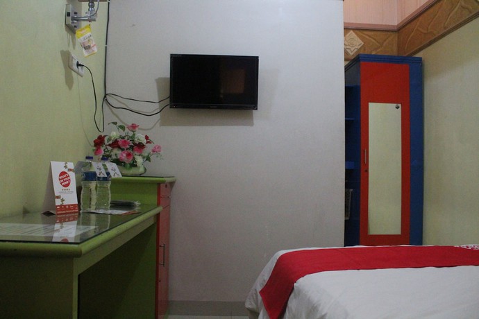 Imagen de la habitación del Hotel OYO 1263 Jazz Anna. Foto 10