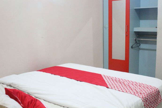 Imagen de la habitación del Hotel OYO 1263 Jazz Anna. Foto 11