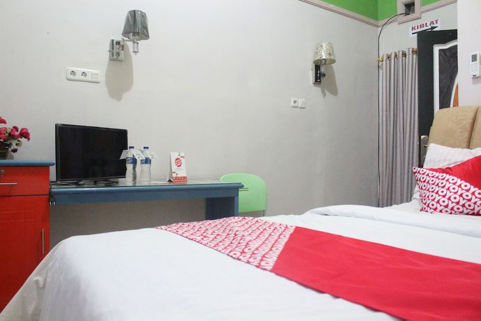 Imagen de la habitación del Hotel OYO 1263 Jazz Anna. Foto 13