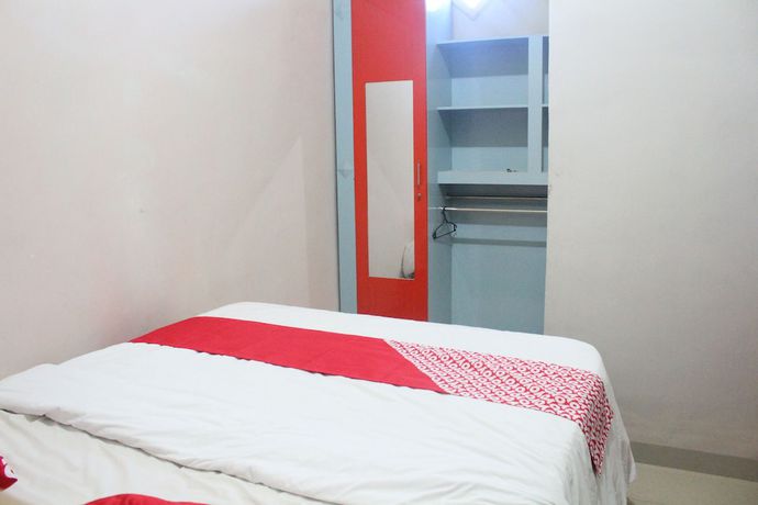 Imagen de la habitación del Hotel OYO 1263 Jazz Anna. Foto 14