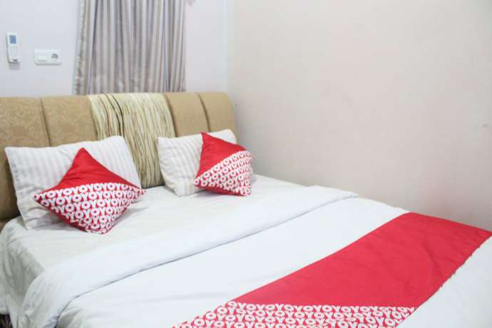 Imagen de la habitación del Hotel OYO 1263 Jazz Anna. Foto 16