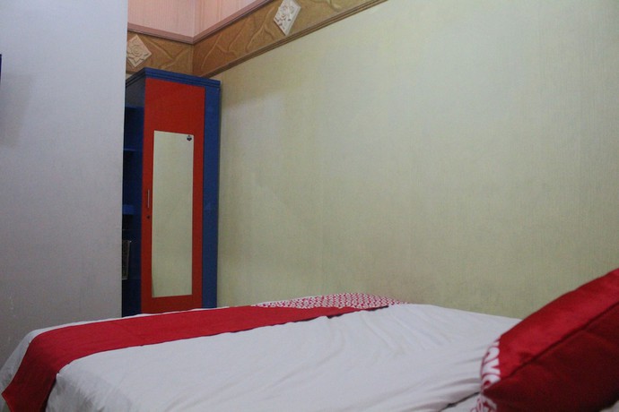 Imagen de la habitación del Hotel OYO 1263 Jazz Anna. Foto 17