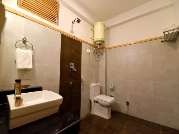 Imagen de la habitación del Hotel OYO 12735 The Manali Lodge. Foto 15